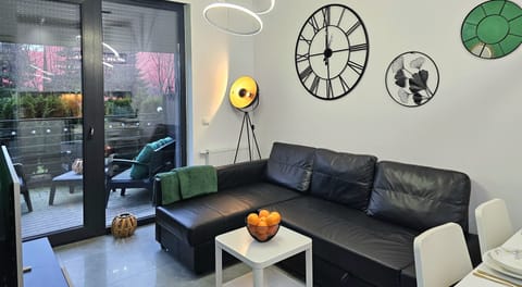 Comfort Apartment | Living area | Flat-screen TV
