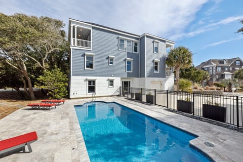 Side pool view of the house