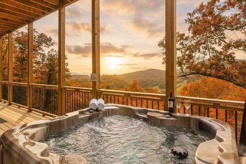 Relax in the outdoor hot tub while enjoying the mountain sunset views.