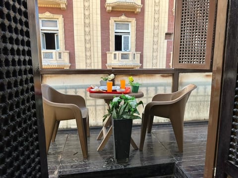 Classic Triple Room, City View | Terrace/patio