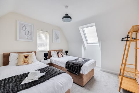 Bedroom 1: Zip-link bed set up as two single beds by default or can be zipped together as a king size bed upon request,