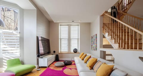 Living Room: Lounge-ready with Smart TV and bold design