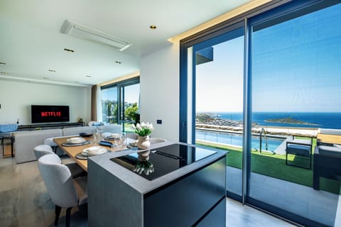 Luxury Villa, Sea View | Living area | Flat-screen TV, heated floors