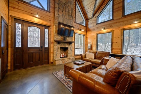 Cabin, Multiple Beds, Hot Tub, Garden View (Logged Out) | Living area | 42-inch flat-screen TV with digital channels, fireplace