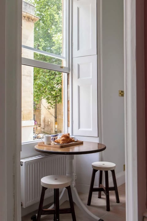 Enjoy a morning coffee and croissant while you watch the world go by