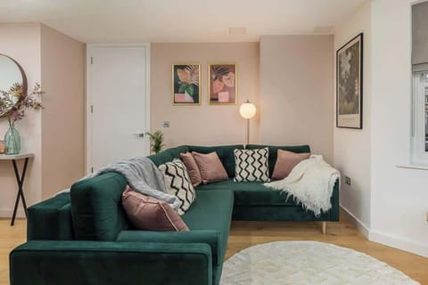 Fabulous living room with rich green sofa (bed)