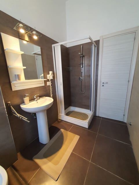Family Quadruple Room, Balcony, Garden View | Bathroom | Shower, free toiletries, hair dryer, bidet