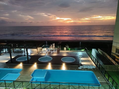 Premium Apartment, Pool Access, Beach View | Pool | Outdoor pool, sun loungers