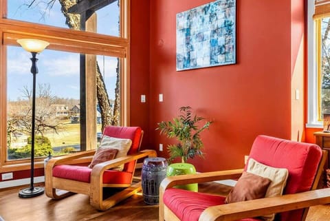 Relax in this bright and inviting corner with stylish chairs, warm decor, and stunning lake views. Perfect for morning coffee, reading, or unwinding while enjoying the natural beauty of Lake Anna.