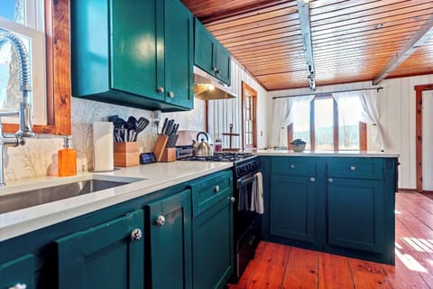 Brighten your day in this vibrant kitchen.