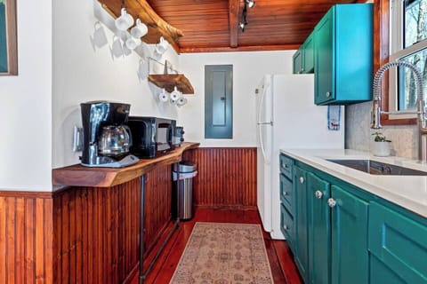 Cook up something delicious in this fully equipped kitchen. 