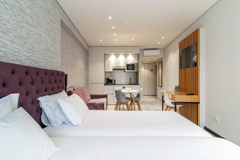 Superior Studio | Premium bedding, down comforters, soundproofing, free cribs/infant beds
