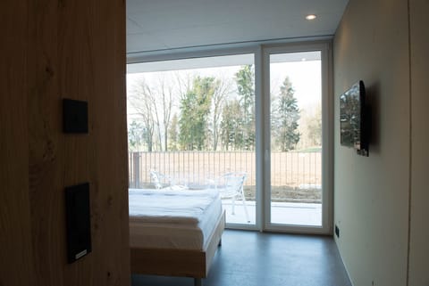 Comfort Single Room, Balcony, Garden View | Premium bedding, desk, laptop workspace, soundproofing