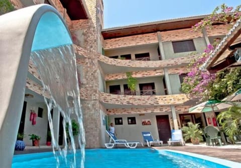 Outdoor pool, open 9:00 AM to 9:00 PM, pool umbrellas, sun loungers