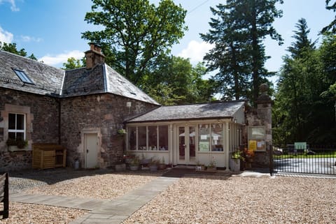 The Hayloft, Kailzie - the property sits in the corner of the courtyard next to a small shop selling local produce and gifts