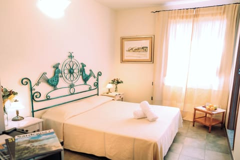 Superior Room | Minibar, free cribs/infant beds, bed sheets