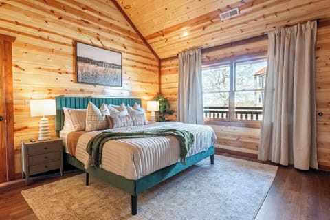Main Floor Bedroom. Sleep soundly in a deluxe king bed on the main level and easy access to the best morning views