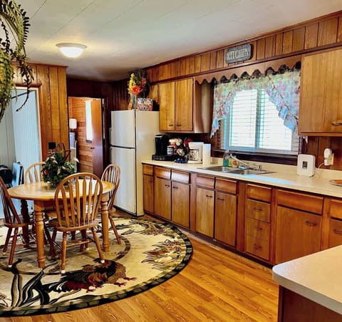 The kitchen is spacious and stocked with all you need to cook your own meals.