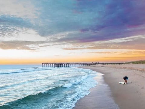 Indulge yourself as you surf with the waves at Sandbridge Surfer Sanctuary