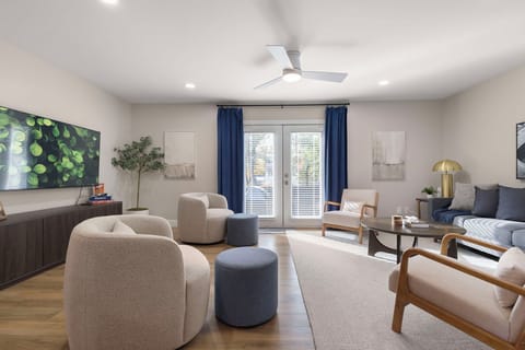 Patio doors for backyard access. Lots of light. Design is clean and uncluttered.