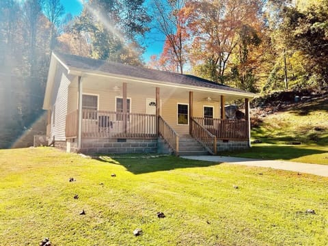 This adorable home is perfect for two couples or a small family. There is plenty of parking and a huge yard for the kids to enjoy. A small creek runs behind the  home and provides a very relaxing atmosphere while sitting on the back porch.