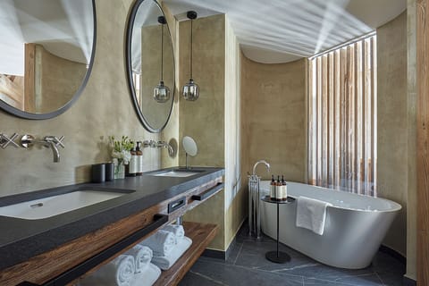 Luxury Suite, Balcony, Mountain View | Bathroom | Bathrobes, slippers, towels, soap