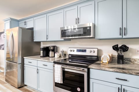 Features ample cabinetry and high-end appliances, designed for both function and style!
