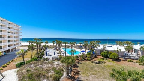 Enjoy breathtaking views of the sparkling Gulf and resort-style pool from your private balcony.