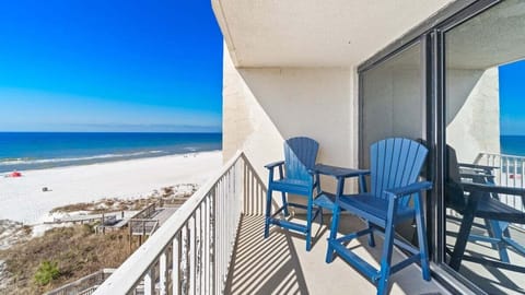 Private balcony with stunning Gulf views and comfy seating—perfect for morning coffee or watching sunsets over the waves.