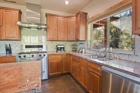 Full kitchen with toaster oven, coffee maker, blender, kitchen aid mixer and more