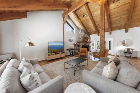 Cozy and spacious living area with TV
