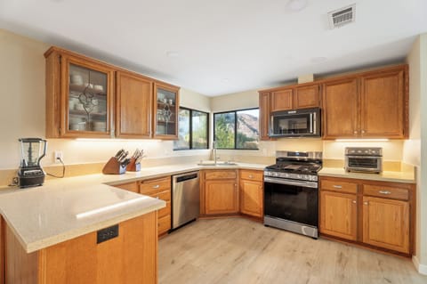 Spacious Kitchen stocked with more than everything you will need for any cooking