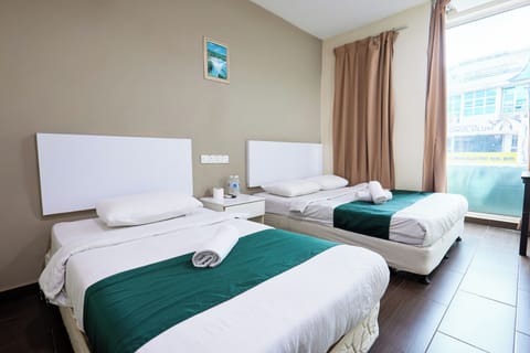 Triple Room, City View | WiFi (free), bed sheets