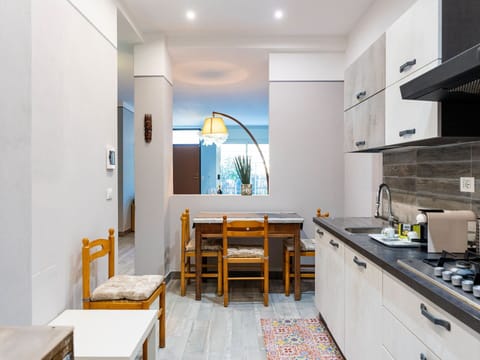 Furniture, Interior Design, Chair, Table, Dining Room, Kitchen & Dining Room Table, Flooring, Floor, Lighting, Room