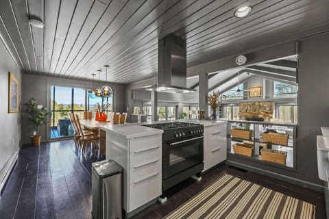 Open kitchen design with a spacious layout, contemporary finishes, and abundant natural light.