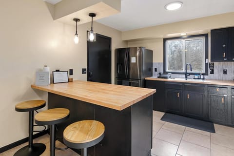 Full kitchen with fridge, freezer, and everything you need for a delicious meal.