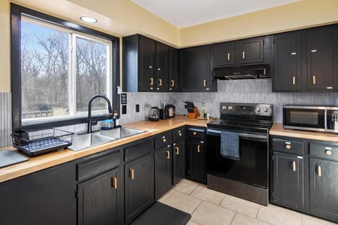 Another view of the fully stocked kitchen