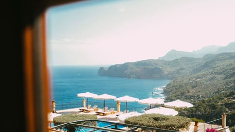 Junior Suite, Sea View | Premium bedding, down comforters, minibar, in-room safe