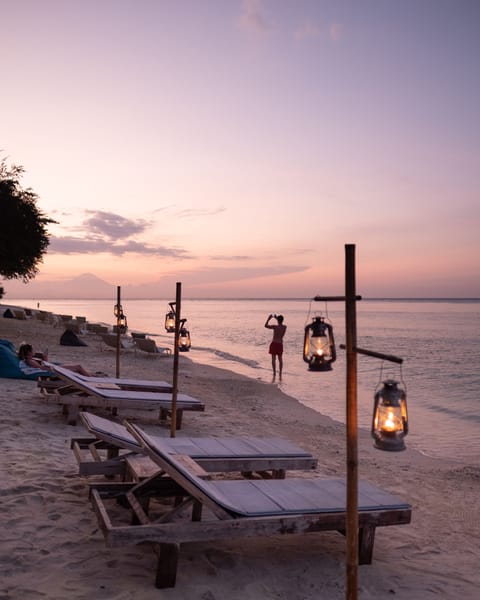 Beach nearby, white sand, sun loungers, beach umbrellas
