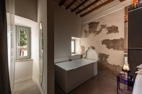 Panoramic Suite, Valley View | Bathroom | Designer toiletries, hair dryer, bathrobes, slippers