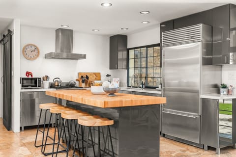 Butcher block island with seating for 4