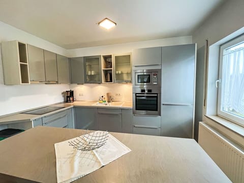 Kitchen, Kitchen Appliance, Cabinetry, Countertop, Furniture, Major Appliance, Flooring, Interior Design, Wood, Home Appliance