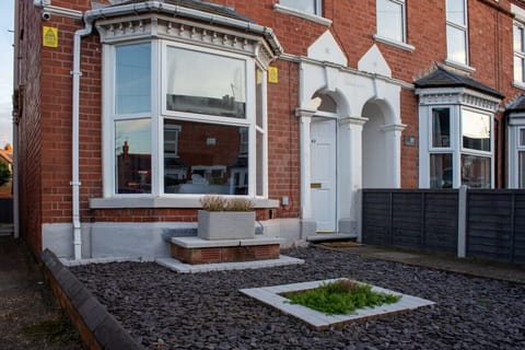 Exterior view of the property with street access and surrounding residential setting.