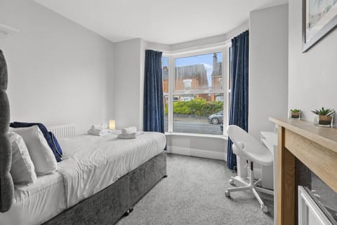Ground floor bedroom with plenty of natural light and space to settle in