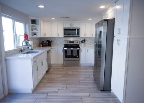 Large, fully stocked kitchen.