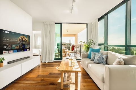 Apartment, Sea View | Living area | TV