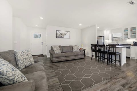 When you first enter our home, you'll be in the open concept living, dining and kitchen space.