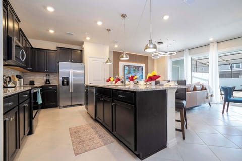 Kitchen & Dining Area – A fully equipped kitchen and spacious dining area make mealtime a breeze.
