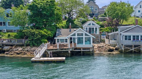 Waterfront contemporary with private dock and deck
