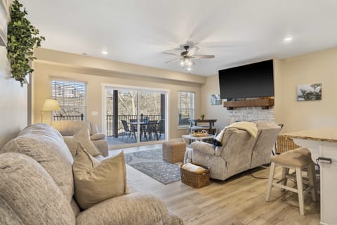 Curl up in the serene living room & enjoy a movie night at home